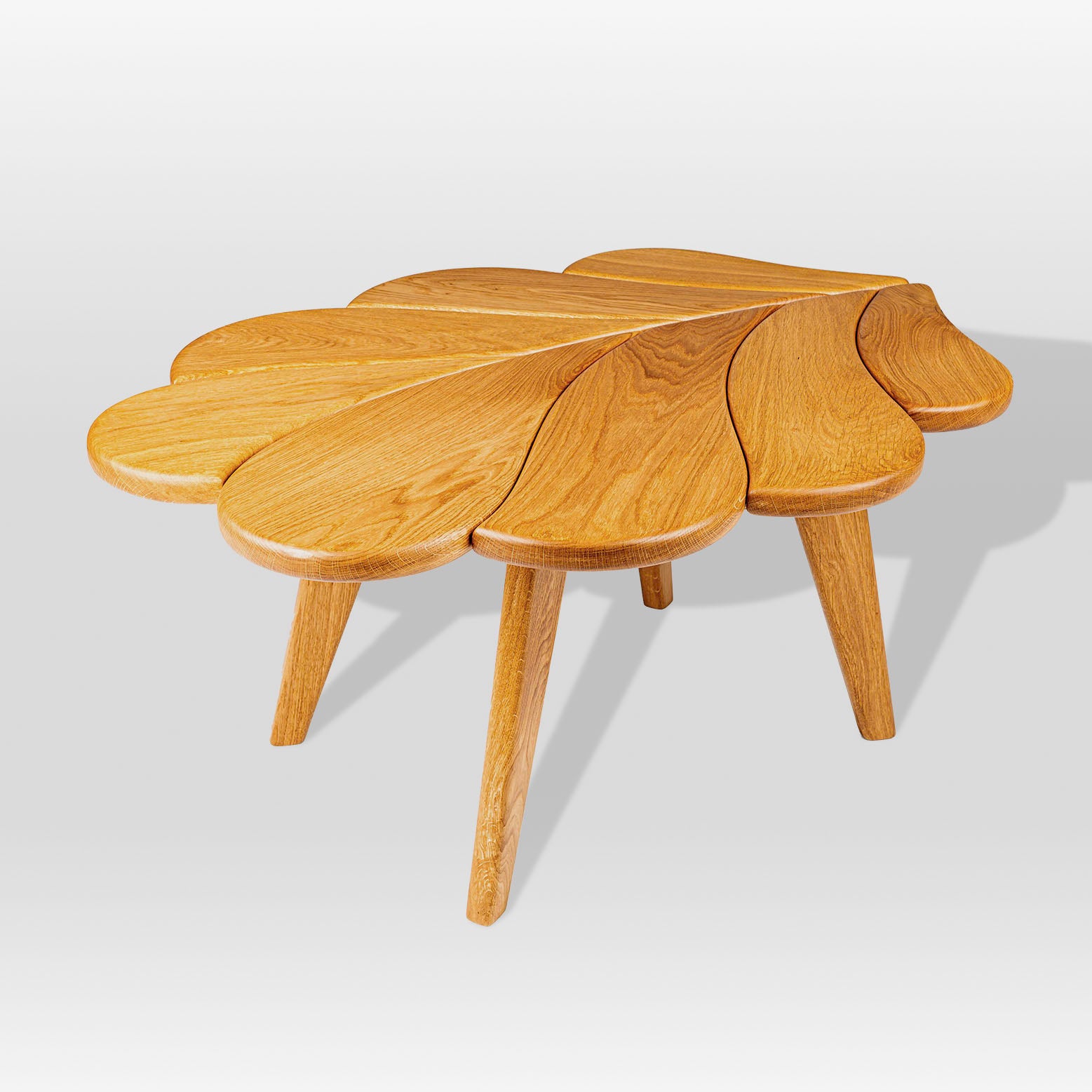 award winning 'Eikinot' coffee table by grankrona shaped as a leaf and made from oak wood