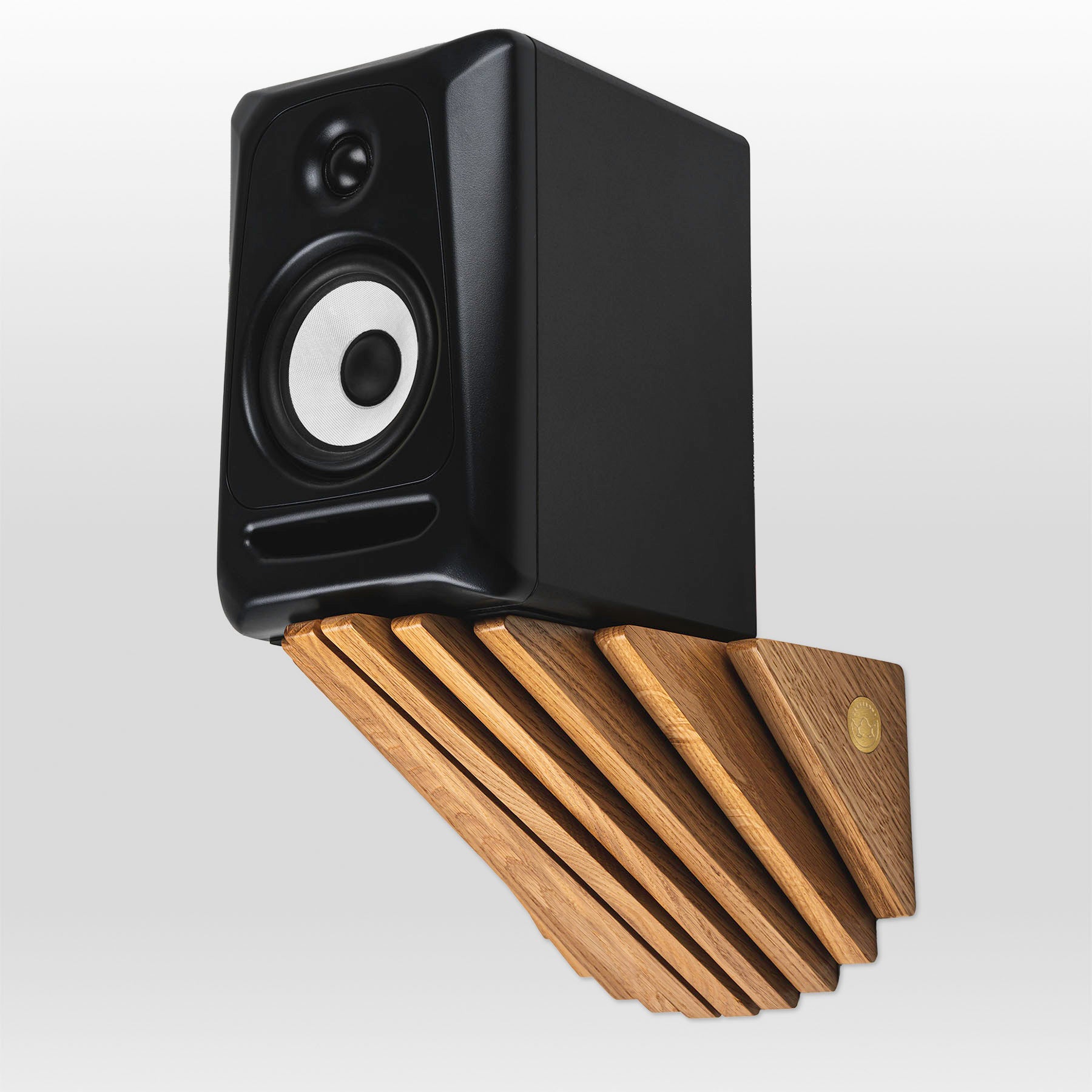 'Cliff' shelf by grankrona with a speaker on top