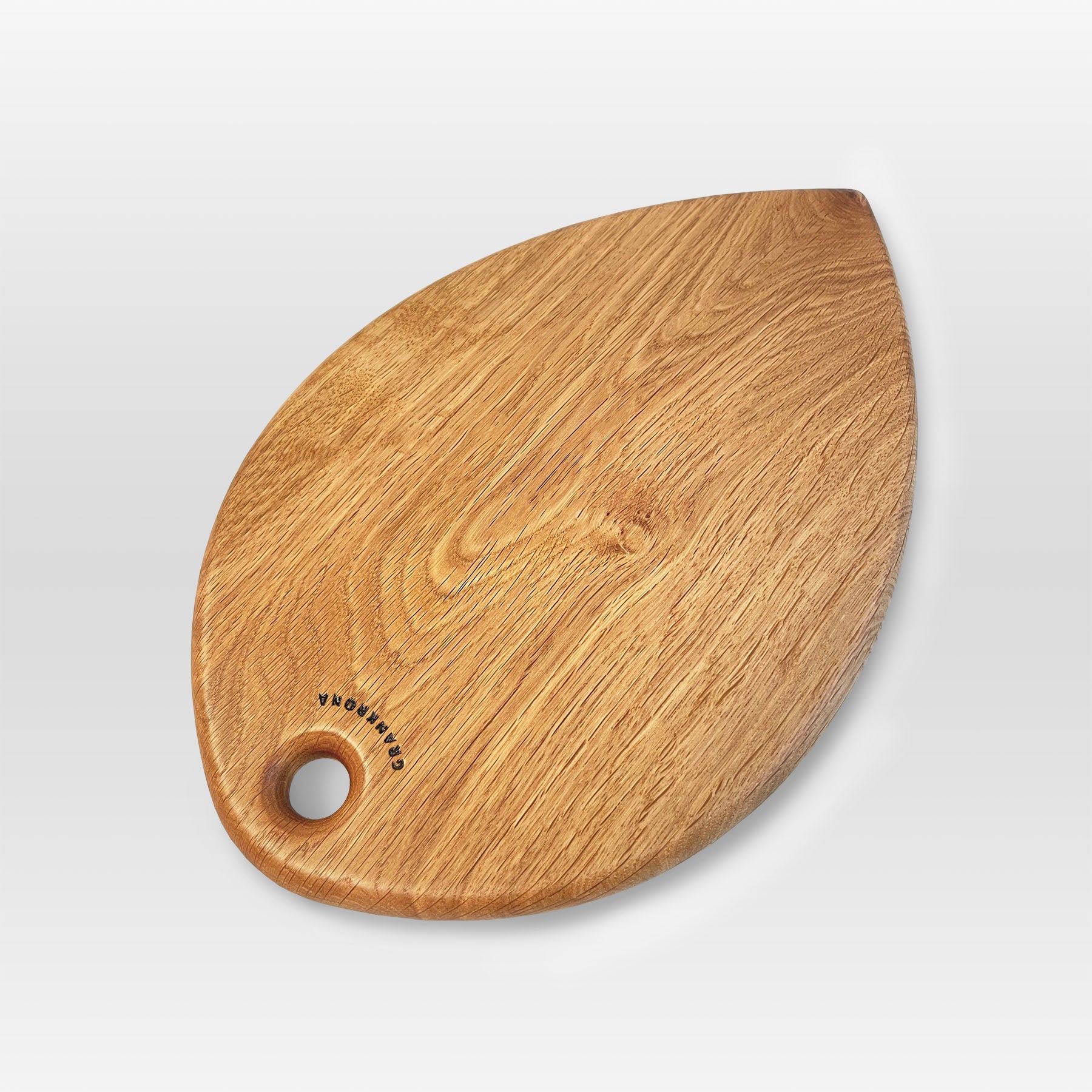 'Petal' serving board by grankrona with interesting oak grain pattern